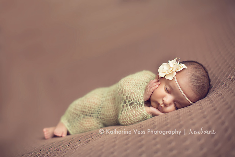 newborn girl wrapped shot