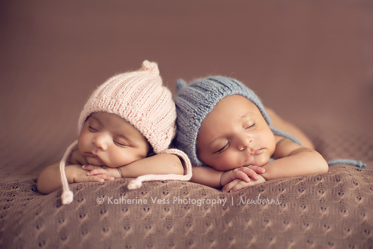 cute boy and girl twin newborns