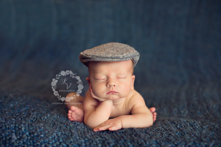 cutest newborn with newsboy hat