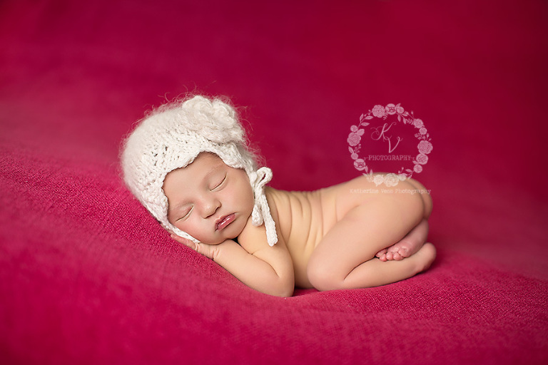 newborn on pink