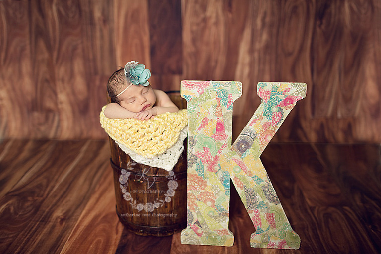 baby girl with initial