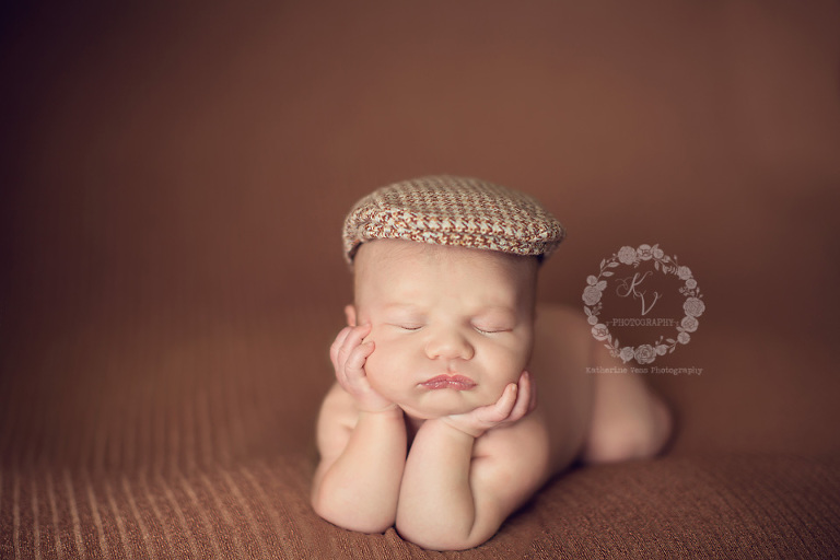 newborn in newsboy hat