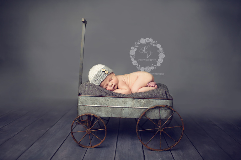 newborn in wagon