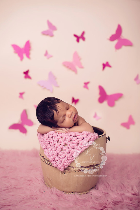 newborn with butterflies