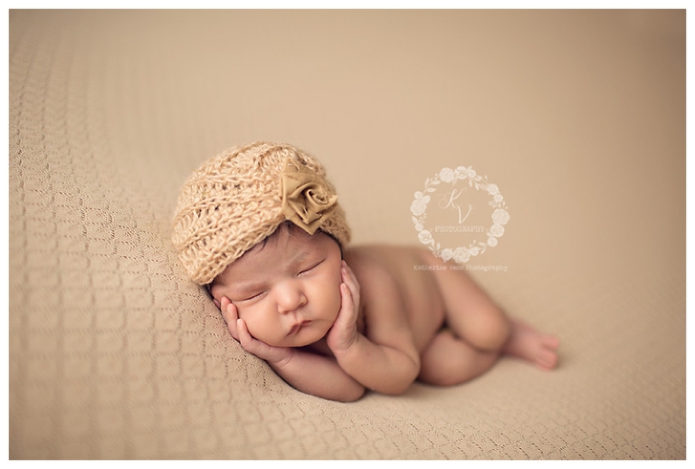 newborn baby girl side laying pose