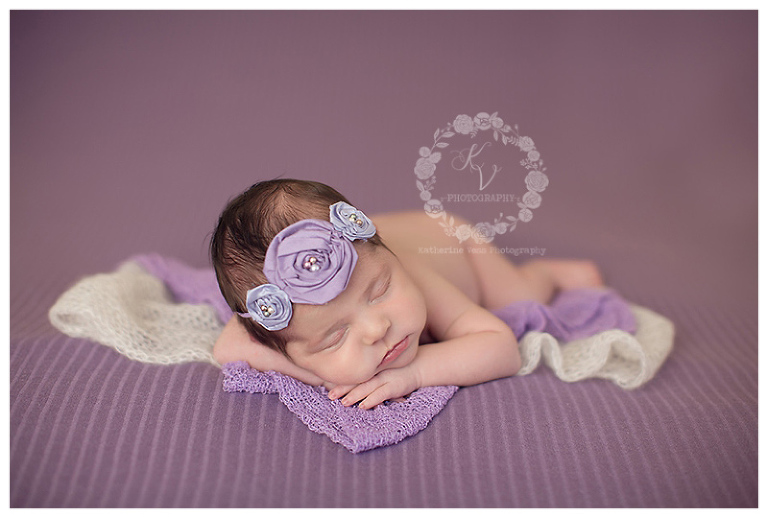 baby girl in purple