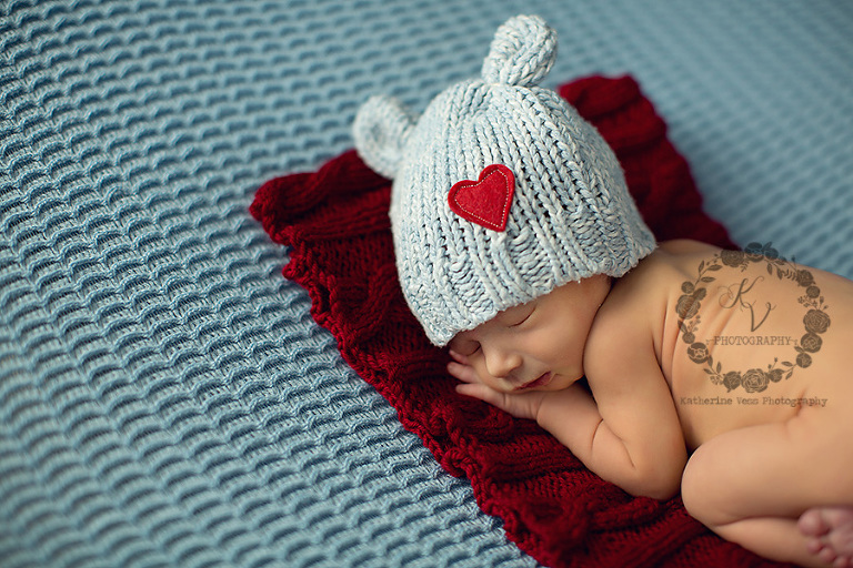 newborn with blue and red setup