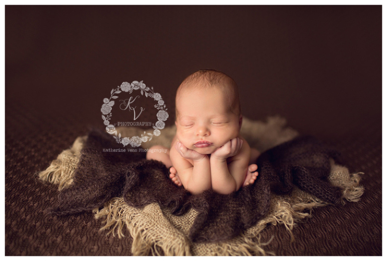 cute newborn pose on layers