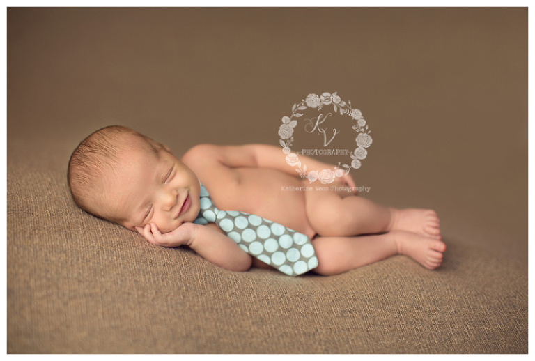 newborn with tie