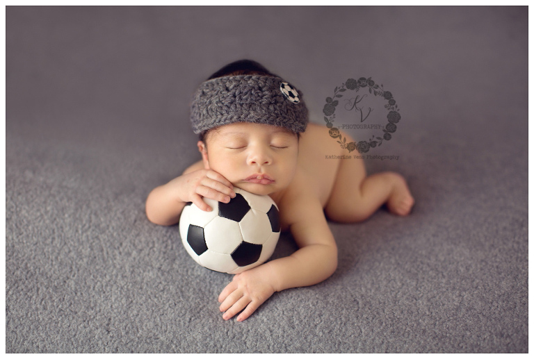 newborn with soccer ball