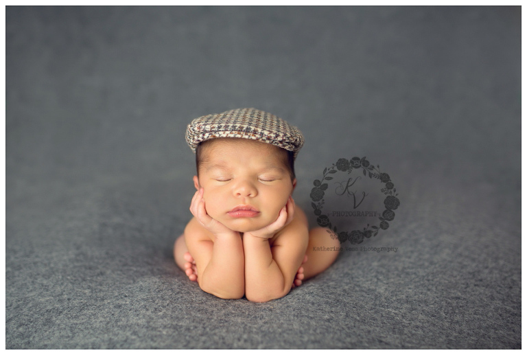 newborn in vintage hat